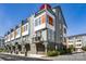 Modern townhome exterior shows stylish design and curb appeal on a sunny day at 2123 Bryant Park Dr, Charlotte, NC 28208