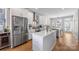 Bright open kitchen with stainless steel appliances and a center island perfect for entertaining at 2123 Bryant Park Dr, Charlotte, NC 28208