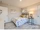 Cozy ' bedroom with a dinosaur theme, featuring a comfortable bed, side table, and bright lighting at 2159 Trollinger Dr, Catawba, NC 28609