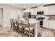 Modern kitchen featuring stainless steel appliances, white cabinets, a center island, and barstool seating at 2159 Trollinger Dr, Catawba, NC 28609