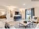 Cozy living room with stylish decor, hardwood floors, and a view to the backyard at 2159 Trollinger Dr, Catawba, NC 28609