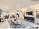 Open concept living room featuring contemporary furniture, hardwood floors, and plenty of natural light at 2159 Trollinger Dr, Catawba, NC 28609