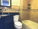 Bathroom with a vanity, toilet, bathtub, and elegant dark granite countertop at 217 Hickory Dr, Mooresville, NC 28115