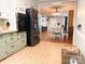 Bright kitchen with stainless steel appliances and an open view into the dining area at 217 Hickory Dr, Mooresville, NC 28115