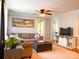 Comfortable living room featuring a cozy seating area and modern entertainment center at 217 Hickory Dr, Mooresville, NC 28115
