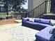 Charming patio area features a plush sectional sofa, inviting outdoor relaxation and entertaining at 217 Hickory Dr, Mooresville, NC 28115