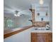 Cozy living area with built-in shelving, breakfast bar, and bright natural light at 2235 Ramblewood Ln, Charlotte, NC 28210