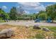 Community playground with various play structures, a picnic pavilion, and walking path, great for activities at 2235 Ramblewood Ln, Charlotte, NC 28210