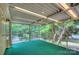Relaxing screened-in porch with outdoor views, perfect for enjoying nature in a tranquil setting at 2235 Ramblewood Ln, Charlotte, NC 28210