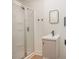 Modern bathroom with a glass-enclosed shower and floating vanity at 235 River Loop Rd, Belmont, NC 28012