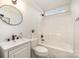 Bright bathroom featuring a shower/tub combo and a modern sink with black hardware at 235 River Loop Rd, Belmont, NC 28012