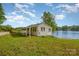 Charming lakefront home with a covered porch and easy access to the water at 235 River Loop Rd, Belmont, NC 28012