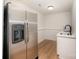 Basement kitchenette features a stainless steel refrigerator and a sleek sink at 235 River Loop Rd, Belmont, NC 28012