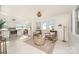 Inviting living room open to the kitchen, featuring comfortable seating and lots of light at 235 River Loop Rd, Belmont, NC 28012