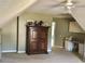 Attic room with a large armoire at 248 Aylesbury Ln, Indian Trail, NC 28079