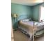 Cozy bedroom featuring a metal bed frame and ample natural light at 248 Aylesbury Ln, Indian Trail, NC 28079