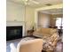 Inviting living room boasts a fireplace and connects to the dining area at 248 Aylesbury Ln, Indian Trail, NC 28079