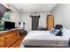 Bedroom featuring a dresser, window and gray walls at 2622 Hemphill St, Charlotte, NC 28208
