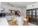 Charming kitchen with an island, seating, ample counter space, and modern appliances at 2622 Hemphill St, Charlotte, NC 28208
