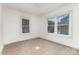 A brightly lit room with two windows at 2622 Hemphill St, Charlotte, NC 28208