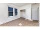A brightly lit room with a closet and a window at 2622 Hemphill St, Charlotte, NC 28208