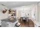 Dining area with a stylish chandelier, a round table with seating, and a built-in coffee bar at 301 Deer Creek Dr, Matthews, NC 28105