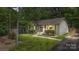 Charming home with well-maintained lawn and paved walkway at 301 Deer Creek Dr, Matthews, NC 28105