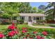 Beautiful home with vibrant landscaping and a well-maintained front lawn and walkway at 301 Deer Creek Dr, Matthews, NC 28105