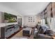 Cozy living room with comfortable seating, hardwood floors, and modern TV setup at 301 Deer Creek Dr, Matthews, NC 28105