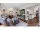 Spacious living room flowing into an open-concept kitchen, creating a welcoming and connected living space at 301 Deer Creek Dr, Matthews, NC 28105