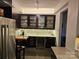 Well appointed kitchen with stainless steel appliances and wine fridge for your enjoyment at 301 W 10Th W St, Charlotte, NC 28202