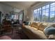 Bright living area with a comfortable couch, city views from a large window, and an adjacent dining area at 301 W 10Th W St, Charlotte, NC 28202