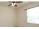 Bright bedroom featuring a ceiling fan and a window with blinds at 309 Kentmere Ln, Clover, SC 29710