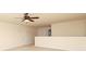 Spacious loft area with neutral carpet, a ceiling fan, and an open design at 309 Kentmere Ln, Clover, SC 29710