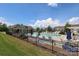 Community pool area offers lounge chairs and umbrellas for relaxing by the pool at 309 Kentmere Ln, Clover, SC 29710