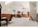 Spacious bonus room with hardwood trim, a TV, skylights, and ample space for entertainment at 3314 Leamington Ln, Charlotte, NC 28226