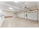 Clean, well-lit three car garage space with epoxy flooring at 3314 Leamington Ln, Charlotte, NC 28226