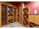 Beautiful custom wine cellar with ample storage and unique tile flooring for the wine enthusiast at 3314 Leamington Ln, Charlotte, NC 28226