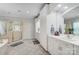 Elegant bathroom with a glass-enclosed shower, double sinks, and ample counter space at 3508 Mountain Cove Dr, Charlotte, NC 28216