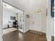 Open foyer featuring hardwood floors, views into the office and dining room, and a welcoming entryway at 405 Winding Oaks Se Ln, Concord, NC 28025
