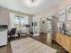 Bright office with hardwood floors, a large window, and stylish furnishings at 405 Winding Oaks Se Ln, Concord, NC 28025