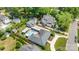 Aerial view of property featuring a pool, patio area, and lush landscaping at 4147 Chelmsford Rd, Charlotte, NC 28211