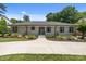 Charming single-story home with manicured lawn, light blue shutters, and inviting front entrance at 4147 Chelmsford Rd, Charlotte, NC 28211