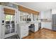 Bright home office with custom built-ins and a wine fridge, offering functionality and style at 4147 Chelmsford Rd, Charlotte, NC 28211
