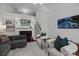 Bright living room featuring a modern fireplace, comfortable seating, and stylish decor at 4941 S Hill View Dr, Charlotte, NC 28210