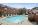 Community pool with lounge chairs offers a refreshing outdoor space for relaxation and recreation at 4941 S Hill View Dr, Charlotte, NC 28210