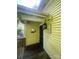 Exterior view of the home's entrance featuring a wooden door and antique decor at 500 W Council St, Salisbury, NC 28144