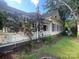 Charming two-story home with black shutters, landscaped yard, and red roses on the porch at 500 W Council St, Salisbury, NC 28144