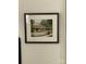 Framed photo of a charming two-story home with landscaped yard and white picket fence at 500 W Council St, Salisbury, NC 28144