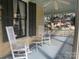 View of the porch with classic rocking chairs, offering an inviting space to enjoy the outdoors at 500 W Council St, Salisbury, NC 28144